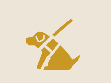 リードを繋がれた盲導犬を表すシルエットアイコン